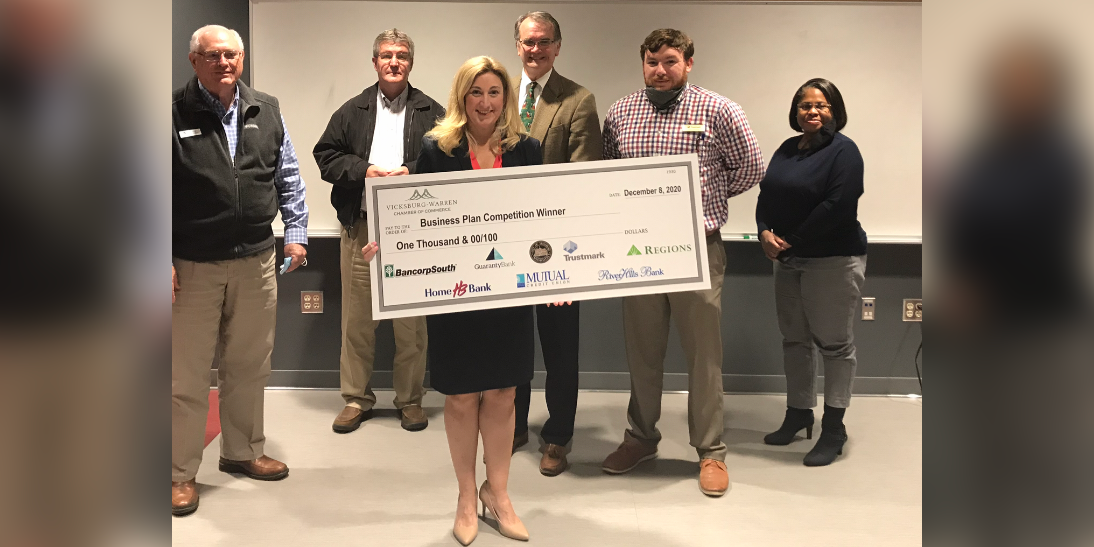 2020 Entrepreneur Boot Camp Winner with check