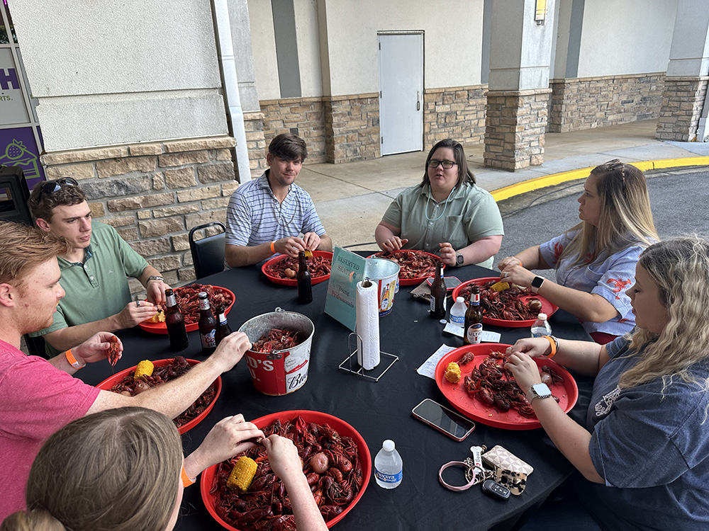 people eating crawfish